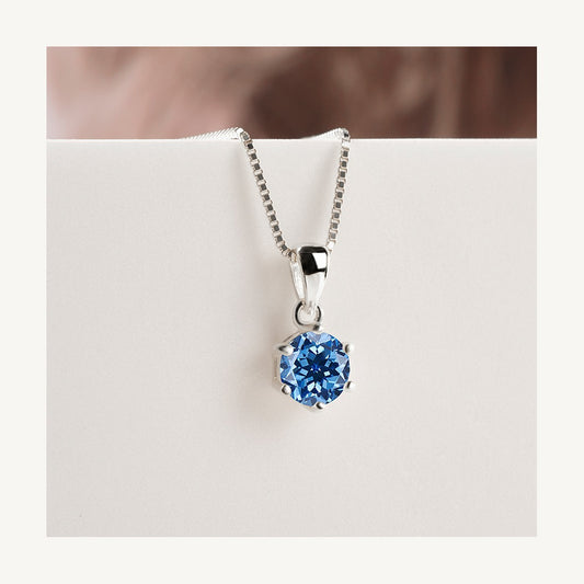 Royal blue lab-created moissanite solitaire pendant