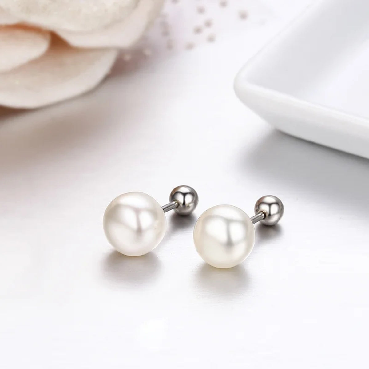 Cultured freshwater pearl stud earrings with screw backs