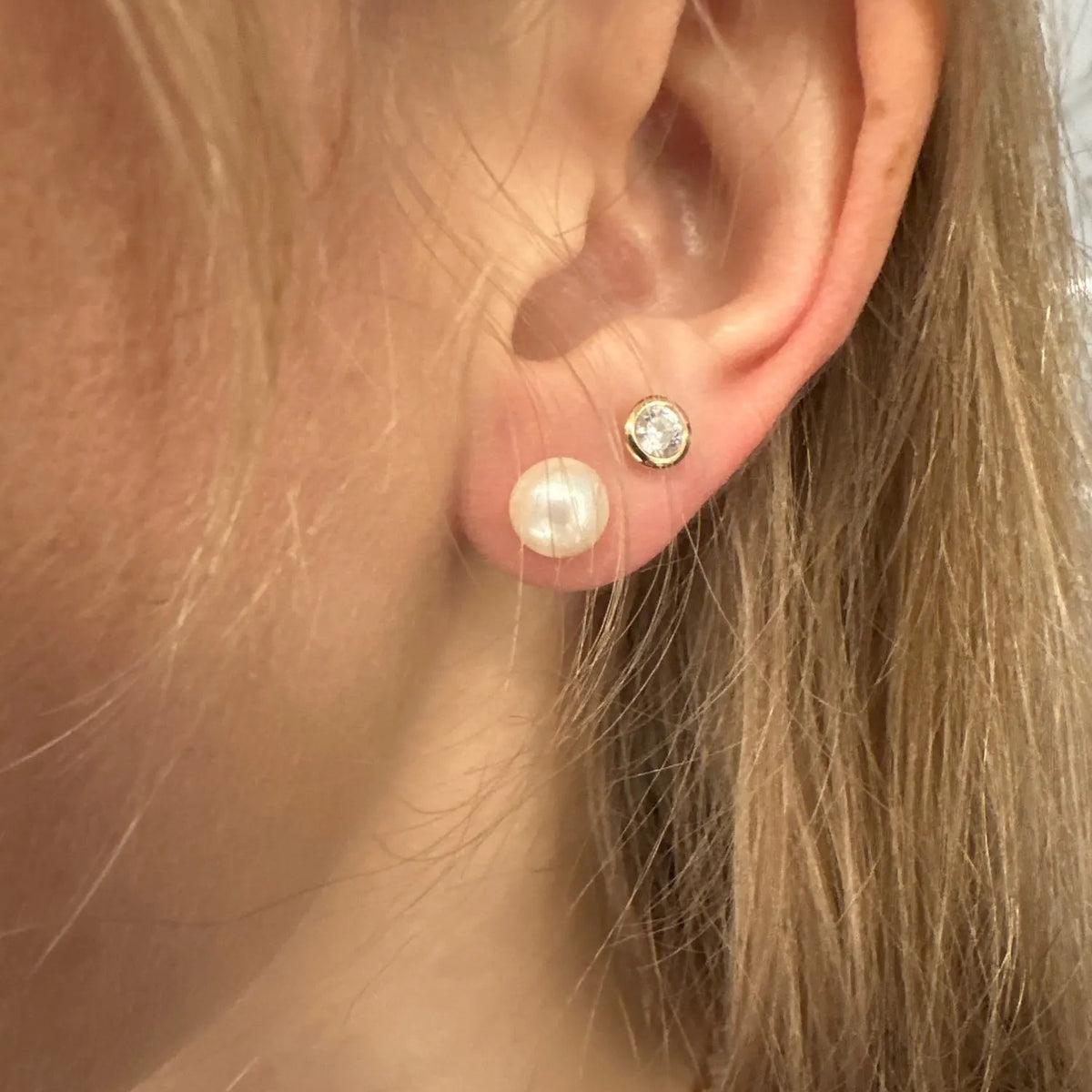 Cultured Freshwater Pearl Stud Earrings, worn on the ear