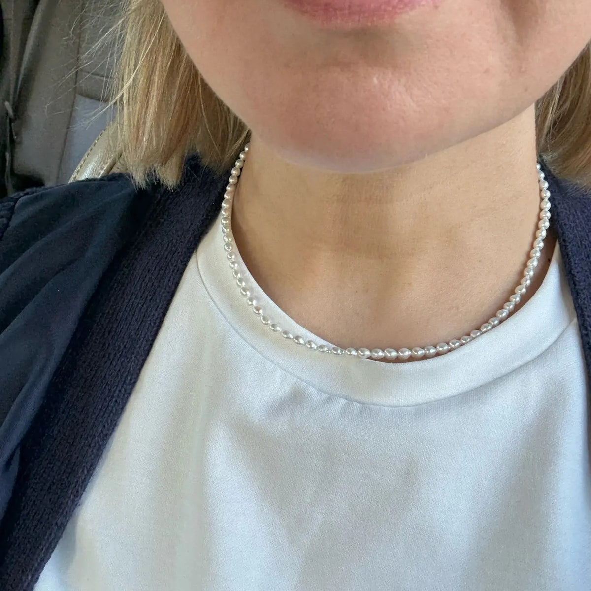 Dainty Cultured Freshwater Pearl Choker Necklace, worn with a white tee