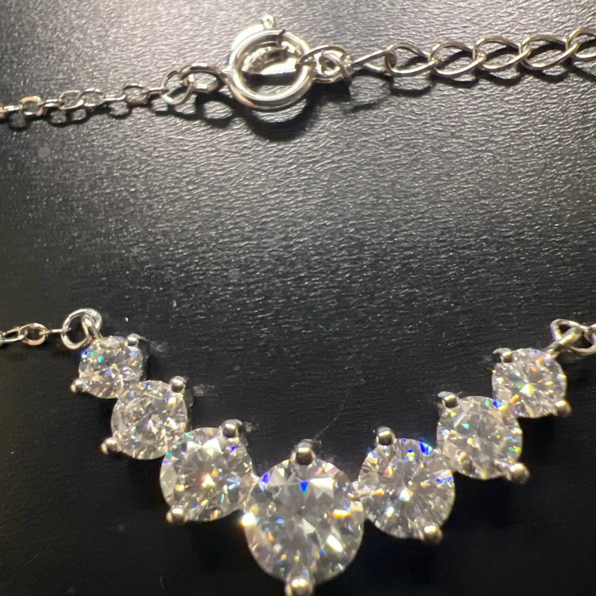 Graduated Lab-Created Moissanite Necklace, close-up of the graduated stones