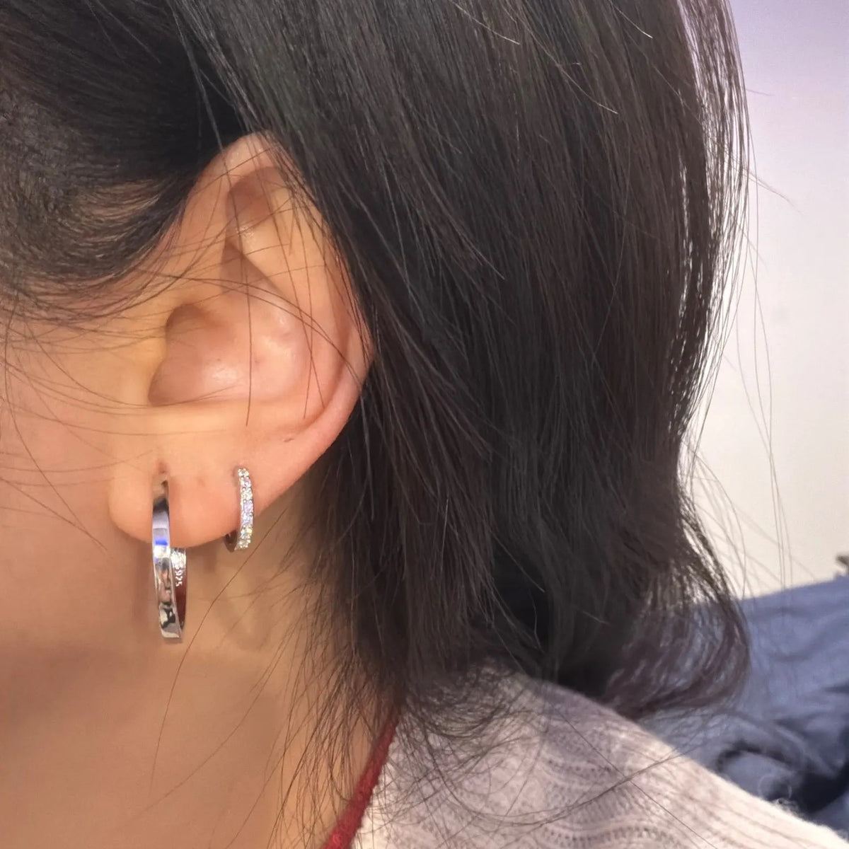 Lab-Created Moissanite Eternity Hoop Earrings, worn on the ear, side view